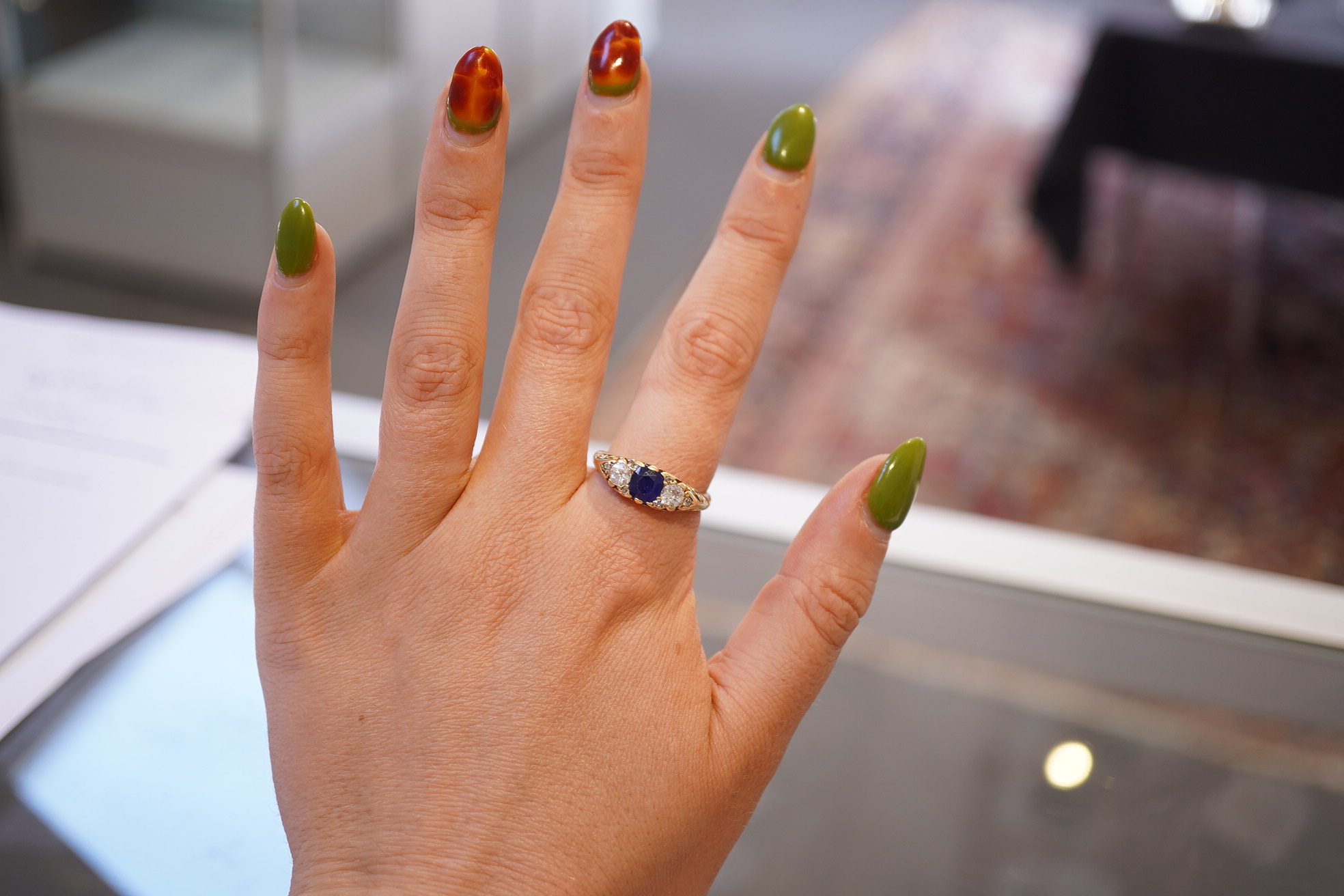A sapphire and diamond ring, circa 1902